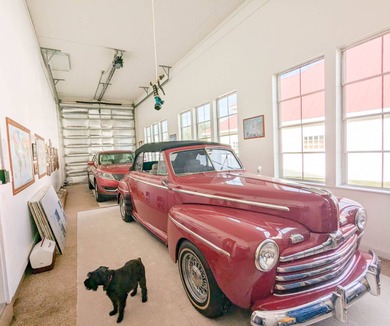 Beautiful lake and golf course views from this custom model home on The Great Outdoors Golf and Country Club in Florida - for sale on GolfHomes.com, golf home, golf lot