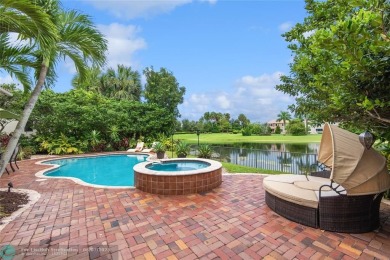 Truly one-of-a-kind home in prestigious Parkland Golf  Country on Parkland Golf Club in Florida - for sale on GolfHomes.com, golf home, golf lot