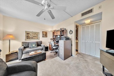 Turnkey Palm Aire condo w/ beautiful golf course views on Palm-Aire Country Club and Resort - Palms in Florida - for sale on GolfHomes.com, golf home, golf lot