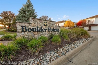 A RARE OPPORTUNITY IN BOULDER POINTE THAT IS MOVE-IN READY! on The Glacier Club in Michigan - for sale on GolfHomes.com, golf home, golf lot