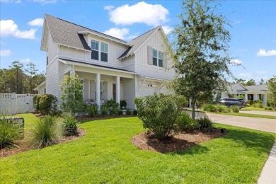 Welcome to 133 E Firethorn Circle, a coastal retreat nestled on on Origins Golf Club in Florida - for sale on GolfHomes.com, golf home, golf lot