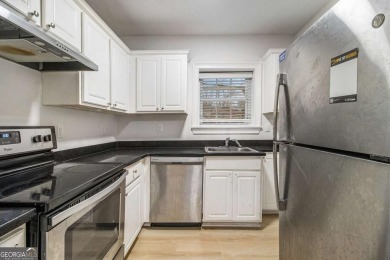Unbeatable value for a 2BR condo inside the perimeter in this on Alfred Tup Holmes Golf Course in Georgia - for sale on GolfHomes.com, golf home, golf lot