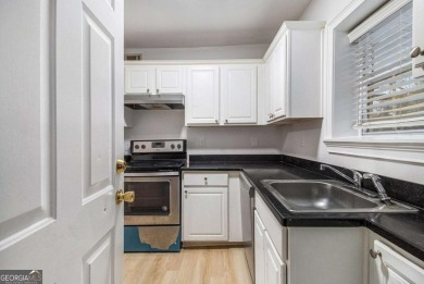 Unbeatable value for a 2BR condo inside the perimeter in this on Alfred Tup Holmes Golf Course in Georgia - for sale on GolfHomes.com, golf home, golf lot