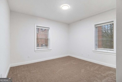 Unbeatable value for a 2BR condo inside the perimeter in this on Alfred Tup Holmes Golf Course in Georgia - for sale on GolfHomes.com, golf home, golf lot