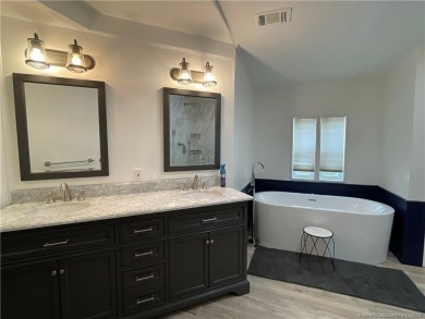 This home is gorgeous! Totally upgraded! Formal living, formal on Indianwood Golf and Country Club in Florida - for sale on GolfHomes.com, golf home, golf lot