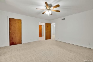 Charming ranch home on 2.58 acres in a peaceful country setting on Lyon Oaks Golf Course in Michigan - for sale on GolfHomes.com, golf home, golf lot
