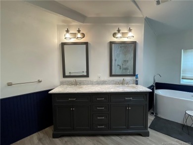 This home is gorgeous! Totally upgraded! Formal living, formal on Indianwood Golf and Country Club in Florida - for sale on GolfHomes.com, golf home, golf lot