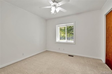 Charming ranch home on 2.58 acres in a peaceful country setting on Lyon Oaks Golf Course in Michigan - for sale on GolfHomes.com, golf home, golf lot