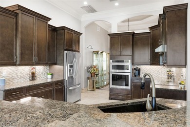 Welcome to this stunning home in the prestigious Cape Royal on Royal Tee Country Club in Florida - for sale on GolfHomes.com, golf home, golf lot