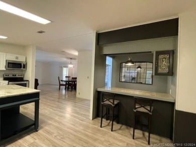 This home is gorgeous! Totally upgraded! Formal living, formal on Indianwood Golf and Country Club in Florida - for sale on GolfHomes.com, golf home, golf lot