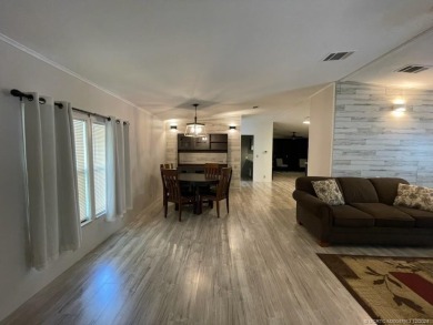 This home is gorgeous! Totally upgraded! Formal living, formal on Indianwood Golf and Country Club in Florida - for sale on GolfHomes.com, golf home, golf lot