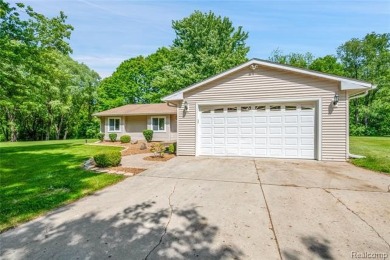Charming ranch home on 2.58 acres in a peaceful country setting on Lyon Oaks Golf Course in Michigan - for sale on GolfHomes.com, golf home, golf lot