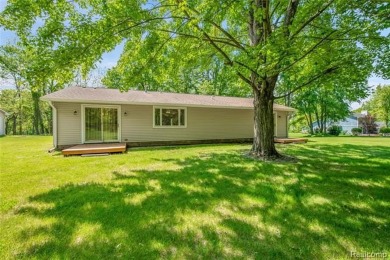 Charming ranch home on 2.58 acres in a peaceful country setting on Lyon Oaks Golf Course in Michigan - for sale on GolfHomes.com, golf home, golf lot