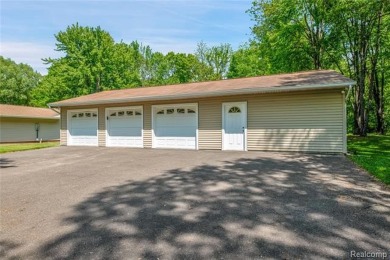 Charming ranch home on 2.58 acres in a peaceful country setting on Lyon Oaks Golf Course in Michigan - for sale on GolfHomes.com, golf home, golf lot
