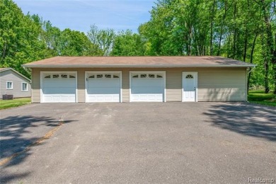 Charming ranch home on 2.58 acres in a peaceful country setting on Lyon Oaks Golf Course in Michigan - for sale on GolfHomes.com, golf home, golf lot