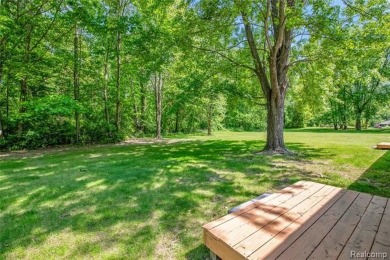 Charming ranch home on 2.58 acres in a peaceful country setting on Lyon Oaks Golf Course in Michigan - for sale on GolfHomes.com, golf home, golf lot