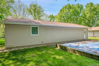 Charming ranch home on 2.58 acres in a peaceful country setting on Lyon Oaks Golf Course in Michigan - for sale on GolfHomes.com, golf home, golf lot