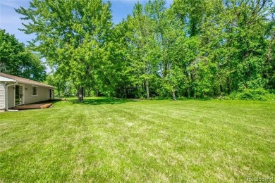 Charming ranch home on 2.58 acres in a peaceful country setting on Lyon Oaks Golf Course in Michigan - for sale on GolfHomes.com, golf home, golf lot