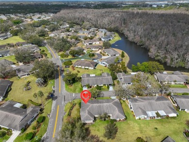 MOVE-IN READY ON A DESIRABLE CORNER LOT IN KINGS POINT!

 on Falcon Watch Golf Club in Florida - for sale on GolfHomes.com, golf home, golf lot