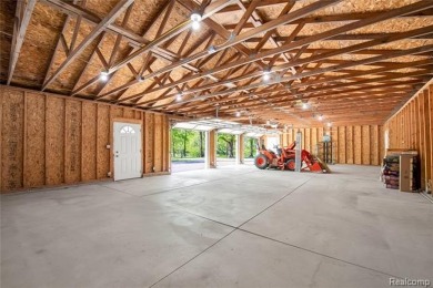 Charming ranch home on 2.58 acres in a peaceful country setting on Lyon Oaks Golf Course in Michigan - for sale on GolfHomes.com, golf home, golf lot