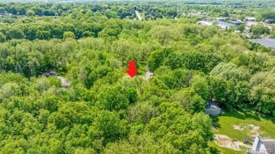 Charming ranch home on 2.58 acres in a peaceful country setting on Lyon Oaks Golf Course in Michigan - for sale on GolfHomes.com, golf home, golf lot