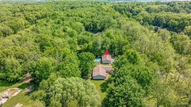 Charming ranch home on 2.58 acres in a peaceful country setting on Lyon Oaks Golf Course in Michigan - for sale on GolfHomes.com, golf home, golf lot