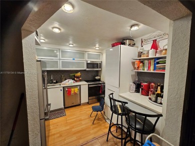 This well-positioned condo offers versatile living with on Inverrary Country Club in Florida - for sale on GolfHomes.com, golf home, golf lot