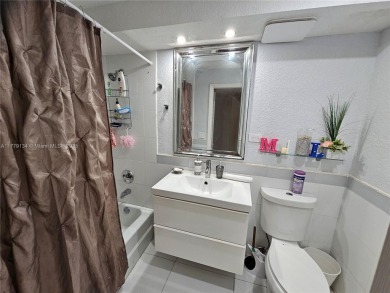 This well-positioned condo offers versatile living with on Inverrary Country Club in Florida - for sale on GolfHomes.com, golf home, golf lot