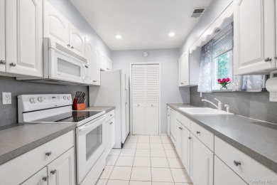 This charming two-bedroom, one-bath Condo exemplifies easy on Holbrook Country Club Golf Course in New York - for sale on GolfHomes.com, golf home, golf lot