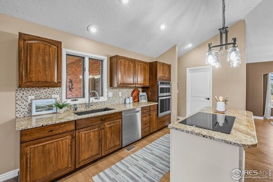 Sprawling brick ranch in the highly coveted Hawkstone on Eaton Country Club in Colorado - for sale on GolfHomes.com, golf home, golf lot