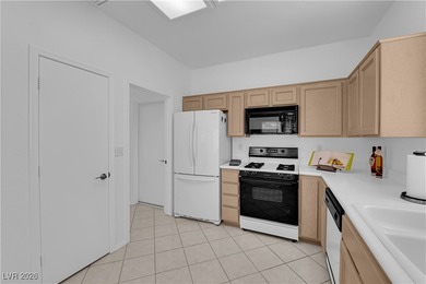 Charming 2-bedroom, 2-bath townhome with a 2-car garage, located on Eagle Crest Golf Club in Nevada - for sale on GolfHomes.com, golf home, golf lot