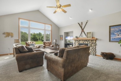 Escape to your perfect vacation retreat in Scenic North Village! on Crystal Mountain Golf Course in Michigan - for sale on GolfHomes.com, golf home, golf lot
