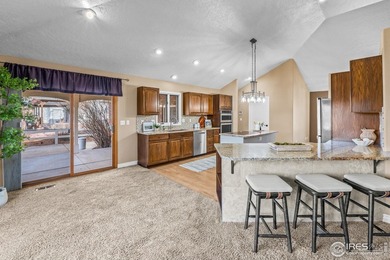 Sprawling brick ranch in the highly coveted Hawkstone on Eaton Country Club in Colorado - for sale on GolfHomes.com, golf home, golf lot