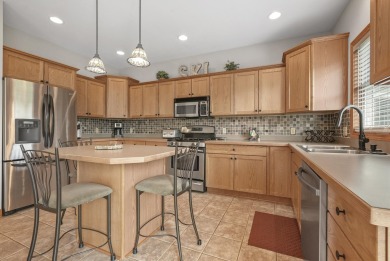 Escape to your perfect vacation retreat in Scenic North Village! on Crystal Mountain Golf Course in Michigan - for sale on GolfHomes.com, golf home, golf lot