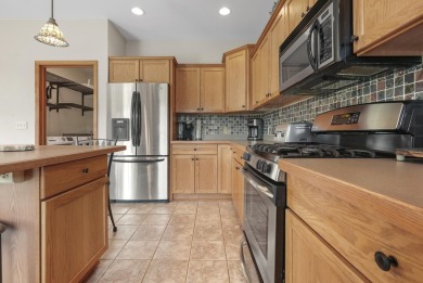 Escape to your perfect vacation retreat in Scenic North Village! on Crystal Mountain Golf Course in Michigan - for sale on GolfHomes.com, golf home, golf lot