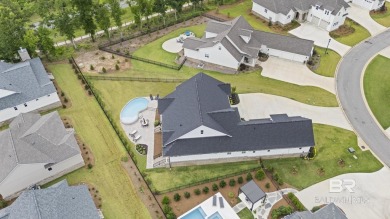 This gold fortified white painted concrete board home in the on Lakewood Golf Club in Alabama - for sale on GolfHomes.com, golf home, golf lot