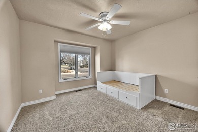 Sprawling brick ranch in the highly coveted Hawkstone on Eaton Country Club in Colorado - for sale on GolfHomes.com, golf home, golf lot