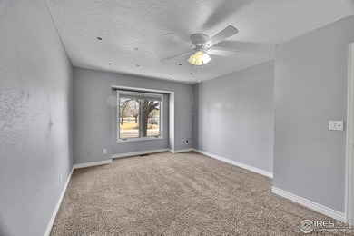 Sprawling brick ranch in the highly coveted Hawkstone on Eaton Country Club in Colorado - for sale on GolfHomes.com, golf home, golf lot