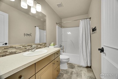 Sprawling brick ranch in the highly coveted Hawkstone on Eaton Country Club in Colorado - for sale on GolfHomes.com, golf home, golf lot