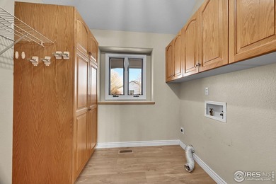 Sprawling brick ranch in the highly coveted Hawkstone on Eaton Country Club in Colorado - for sale on GolfHomes.com, golf home, golf lot