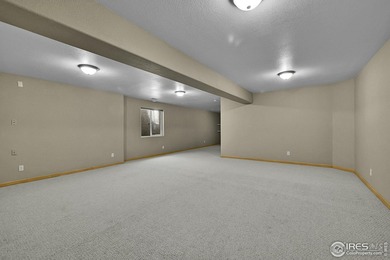 Sprawling brick ranch in the highly coveted Hawkstone on Eaton Country Club in Colorado - for sale on GolfHomes.com, golf home, golf lot