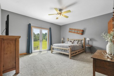 Escape to your perfect vacation retreat in Scenic North Village! on Crystal Mountain Golf Course in Michigan - for sale on GolfHomes.com, golf home, golf lot