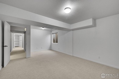 Sprawling brick ranch in the highly coveted Hawkstone on Eaton Country Club in Colorado - for sale on GolfHomes.com, golf home, golf lot