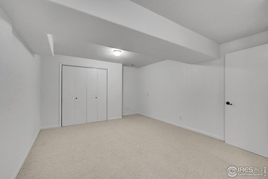 Sprawling brick ranch in the highly coveted Hawkstone on Eaton Country Club in Colorado - for sale on GolfHomes.com, golf home, golf lot