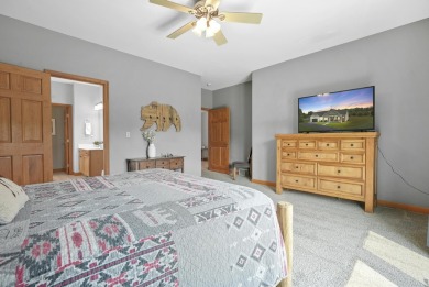 Escape to your perfect vacation retreat in Scenic North Village! on Crystal Mountain Golf Course in Michigan - for sale on GolfHomes.com, golf home, golf lot