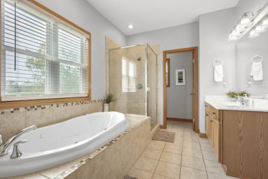 Escape to your perfect vacation retreat in Scenic North Village! on Crystal Mountain Golf Course in Michigan - for sale on GolfHomes.com, golf home, golf lot