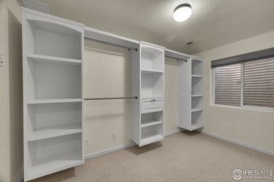 Sprawling brick ranch in the highly coveted Hawkstone on Eaton Country Club in Colorado - for sale on GolfHomes.com, golf home, golf lot