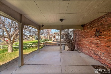 Sprawling brick ranch in the highly coveted Hawkstone on Eaton Country Club in Colorado - for sale on GolfHomes.com, golf home, golf lot