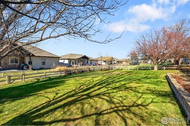 Sprawling brick ranch in the highly coveted Hawkstone on Eaton Country Club in Colorado - for sale on GolfHomes.com, golf home, golf lot