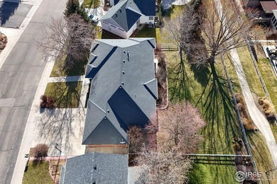 Sprawling brick ranch in the highly coveted Hawkstone on Eaton Country Club in Colorado - for sale on GolfHomes.com, golf home, golf lot